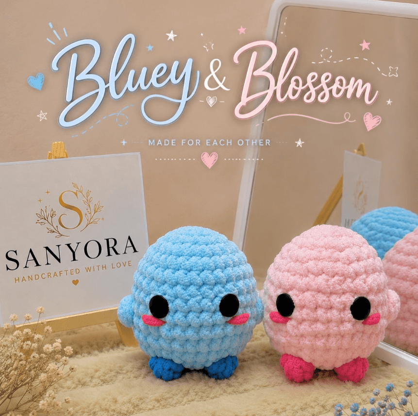 Close-up of Bluey, the blue crochet plush, with rosy cheeks