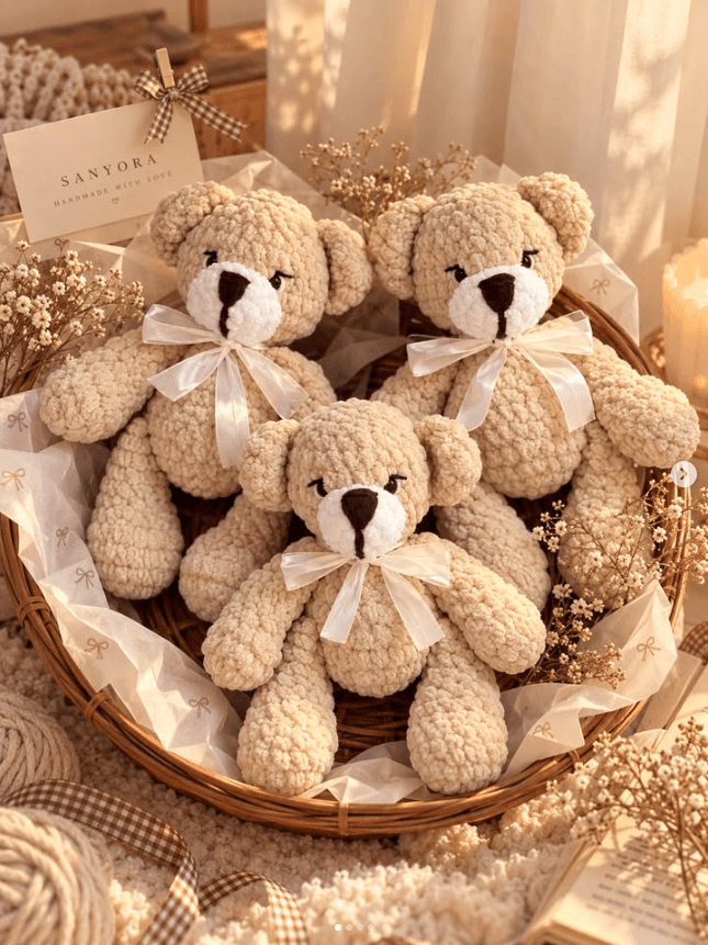 Close-up of the teddy's stitched face and satin bow